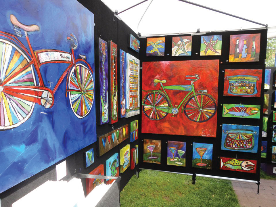 Art in Bayfront Park in Duluth of colorful cartoon-like bicycles, fish, coctails, etc.