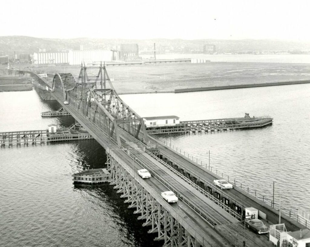 Black and white historical photo from 1961 of a switch bridge in Duluth Harbor.