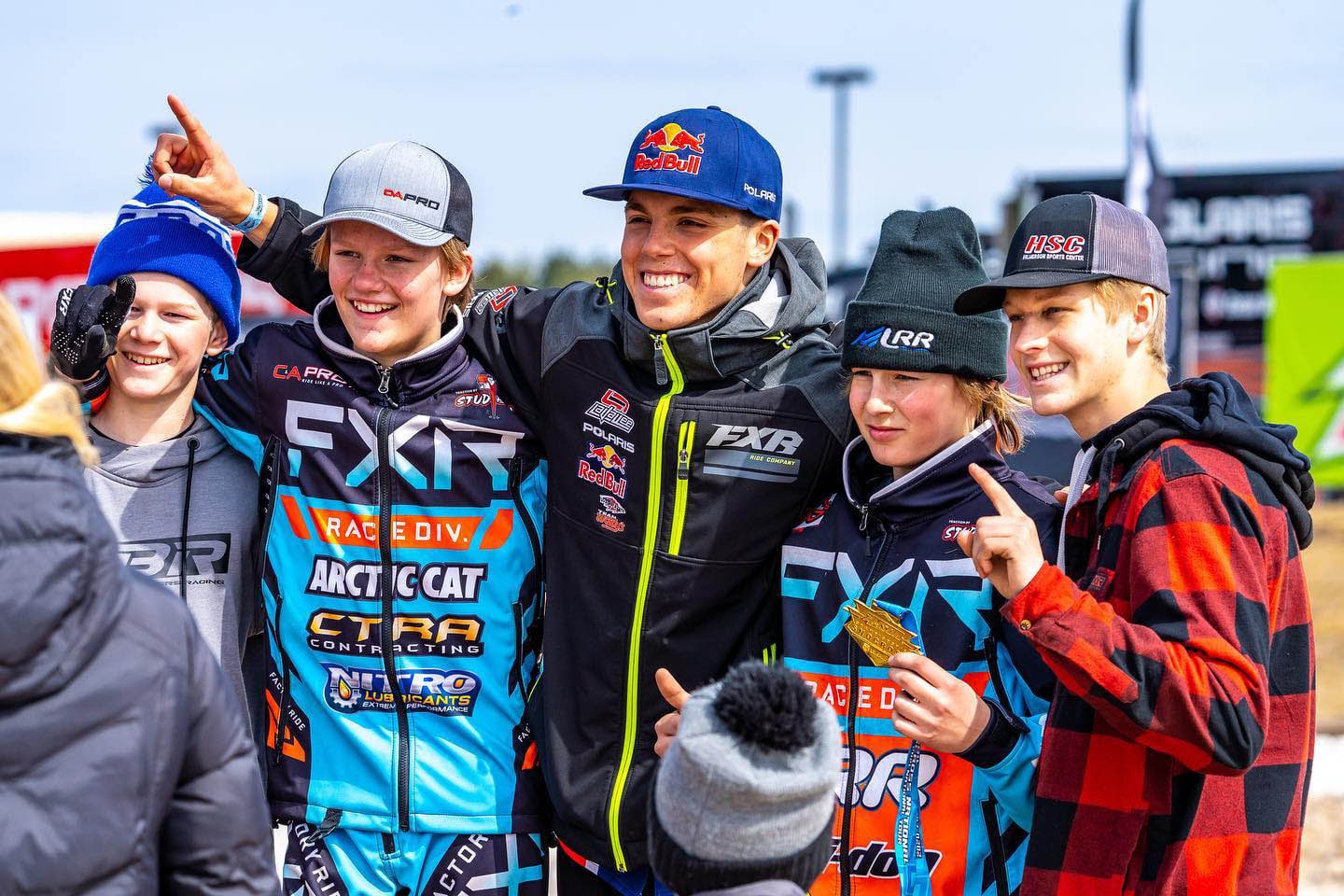 Five young people pose for the camera at SnowCross.