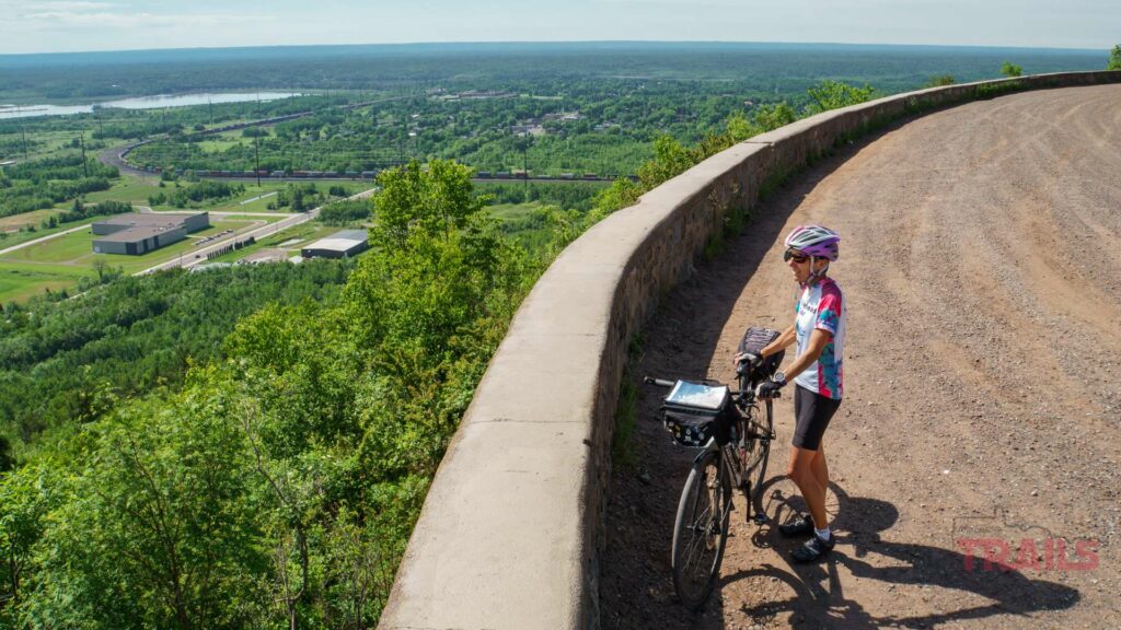 Man admiring the view with his bicycle on Skyline Parkway west.