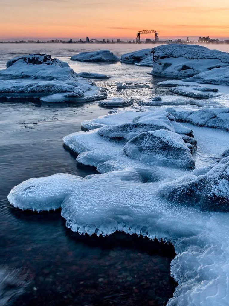 Ice on the Shores of Lake Superior with a view of the Aerial Lift Bridge