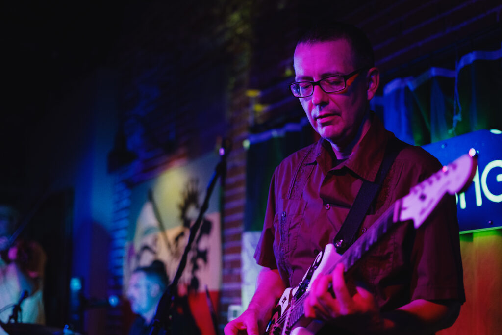 Musician playing at Bent Paddle