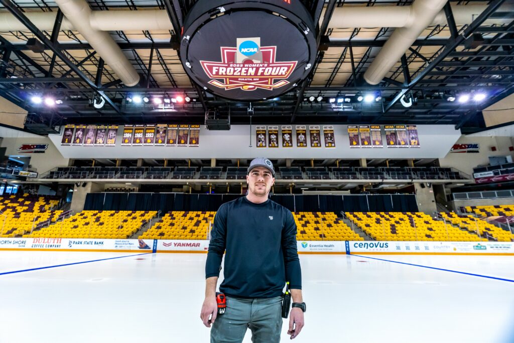 Jake Magdzas stands on the ice at AMSOIL Arena