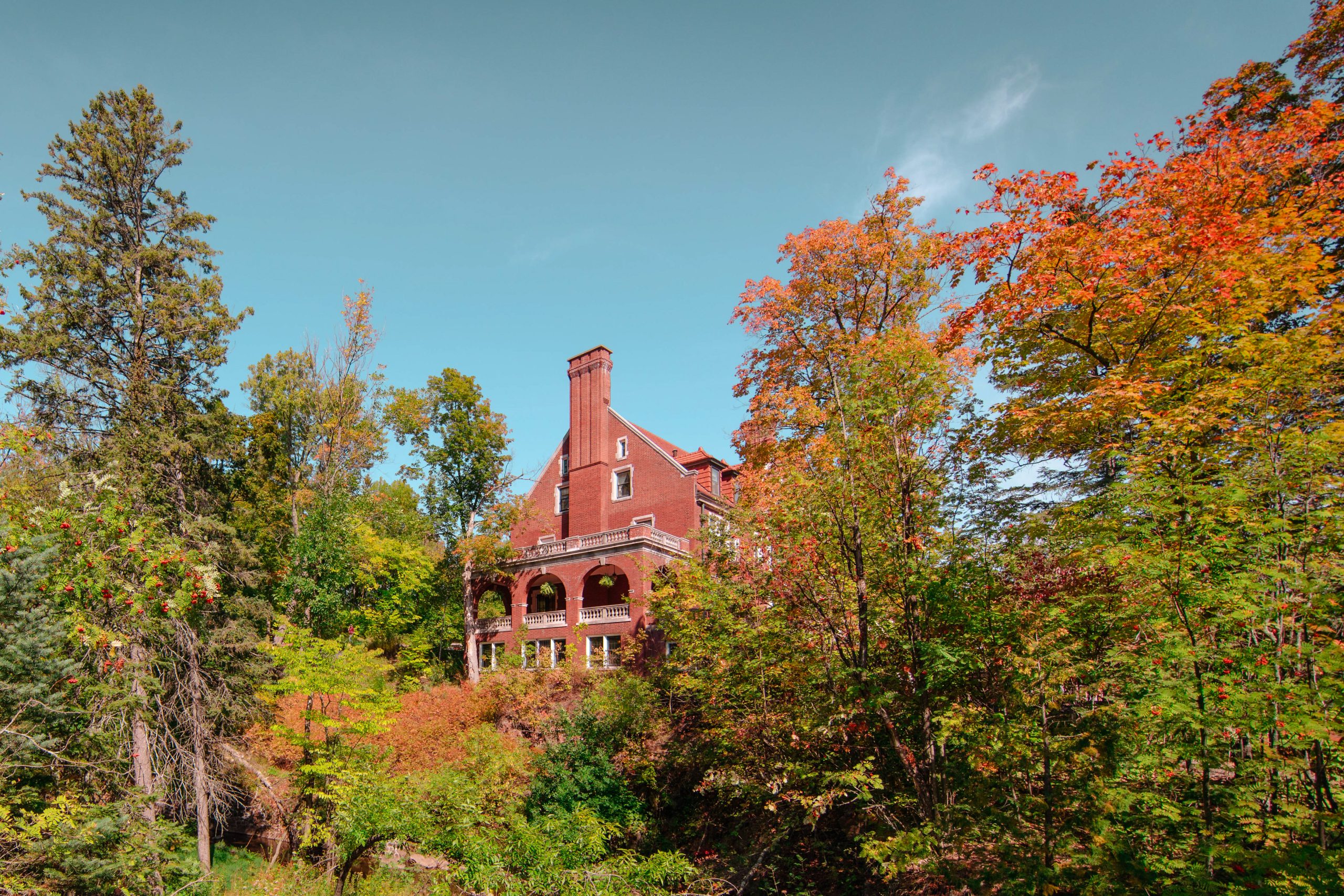 Haunted duluth: spooky spots & legendary haunts 5 Glensheen mansion surrounded by autumn foliage in duluth, mn