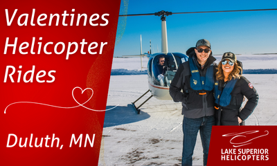 couple in front of a helicopter