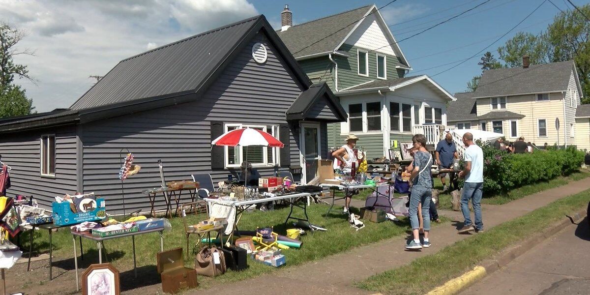 people shopping at a rummage sale