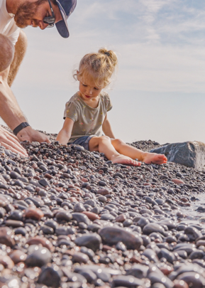 Girl and father at the shore of Lake Superior