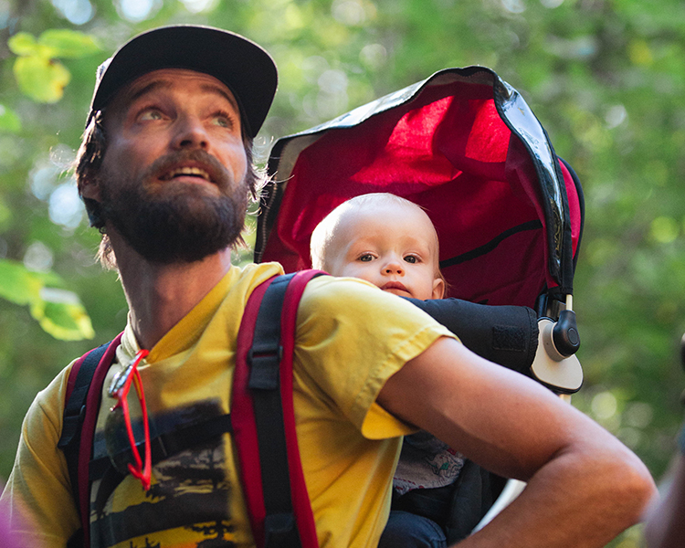 man hiking with a child