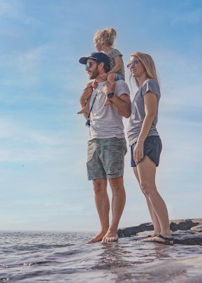 Family enjoying a day at brighton beach in duluth, mn