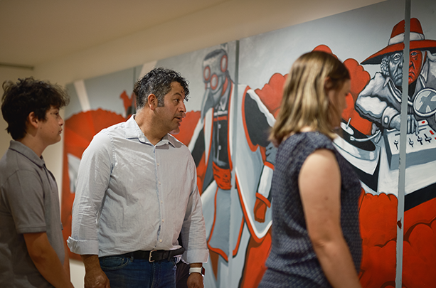 People looking at art at the Tweed Museum