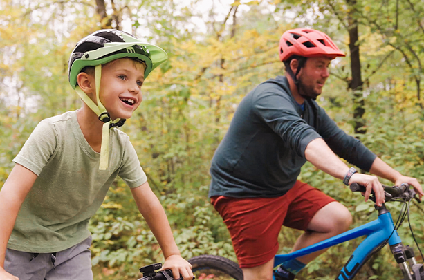 Man and boy biking