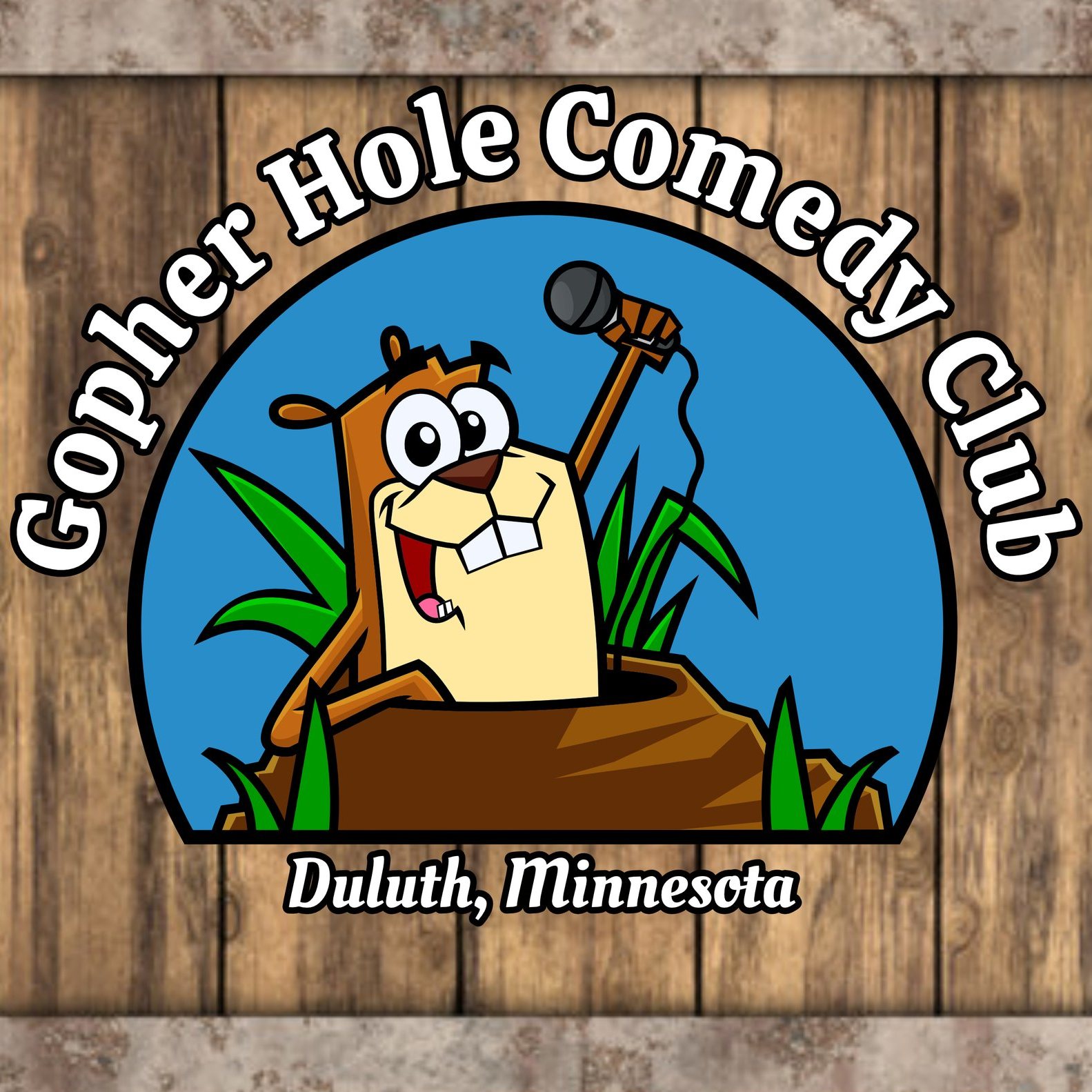 Gopher Hole Comedy Club logo with cartoon gopher holding microphone