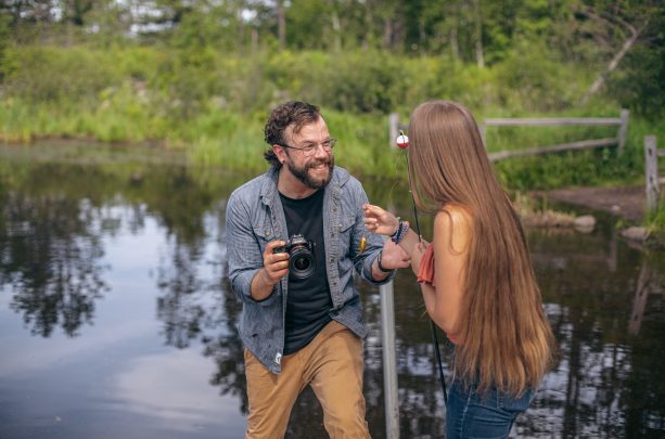 A man and his daughter get excited while fishing together in duluth, mn