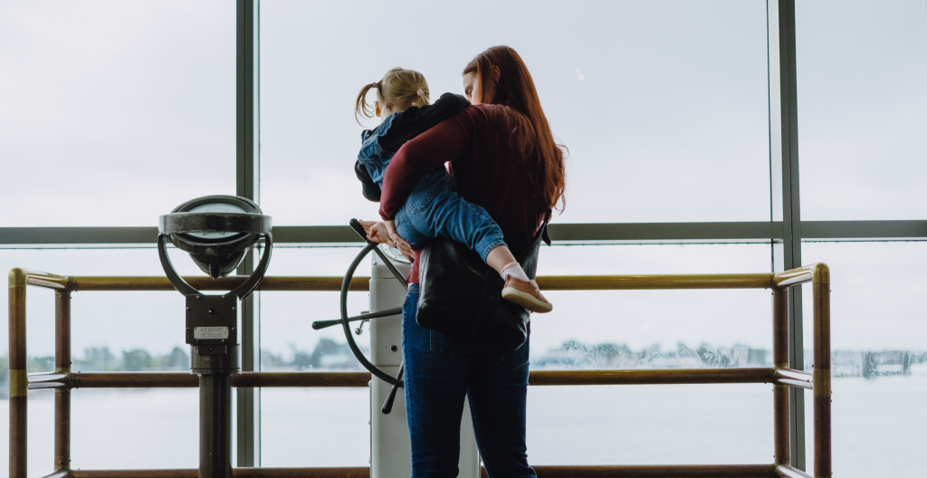 Indoor things to do in duluth, whatever the weather 1 Image shows mom and child overlooking the harbor from inside the great lakes aquarium in duluth, mn.
