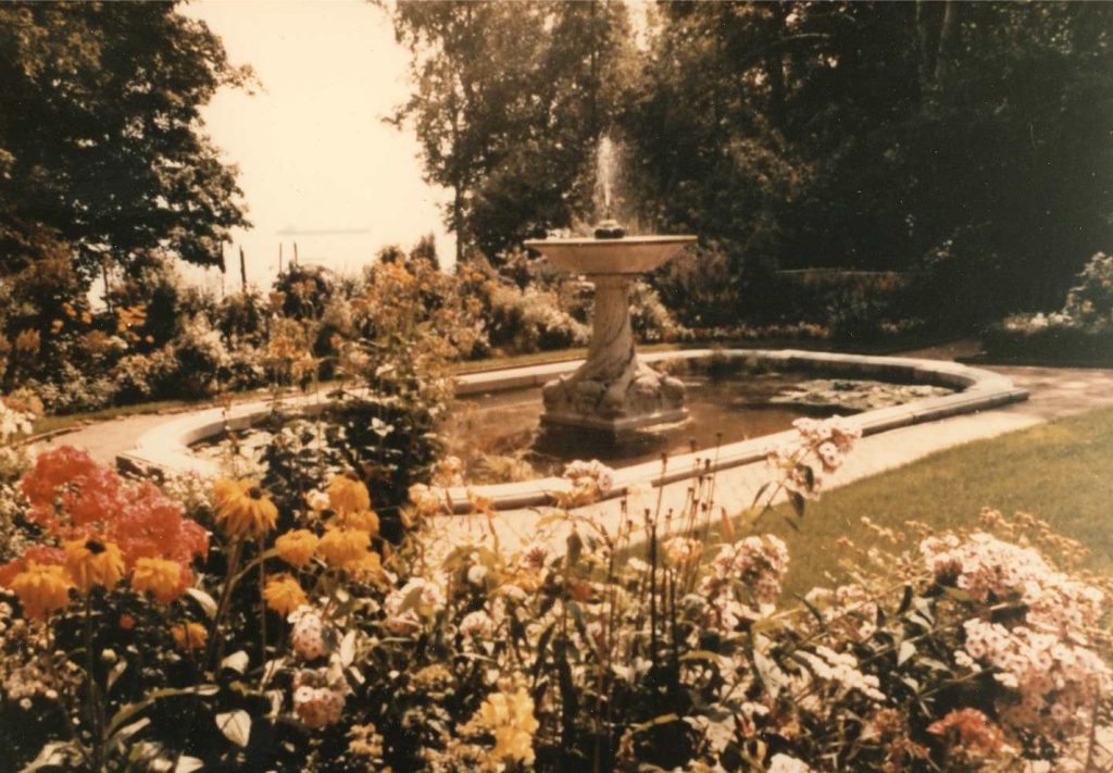 Insights from glensheen’s gardens with head gardener emily ford 4 Vintage 1969 view of glensheen’s formal garden fountain in duluth, framed by colorful summer flower beds and tall trees.